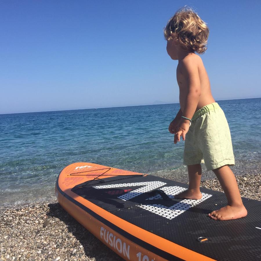 Sea View With Bicycles And Stand-up Paddle Capo d'Orlando